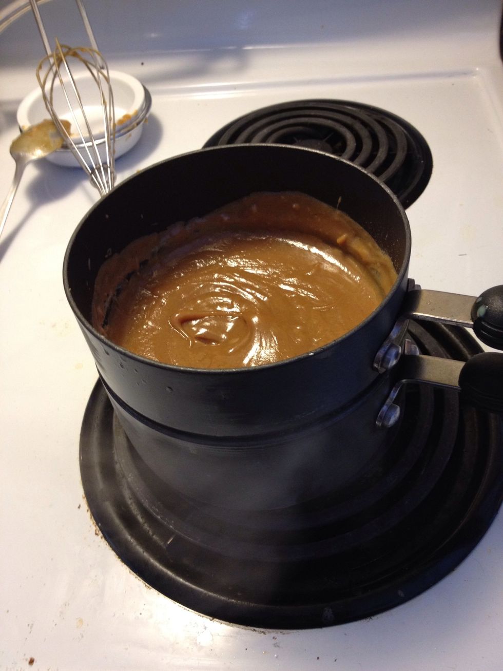 While your chocolates melting I like to add a bit of milk just to help it go a little more runny also it didn't make the chocolate go really hard. I used Reeses chips.