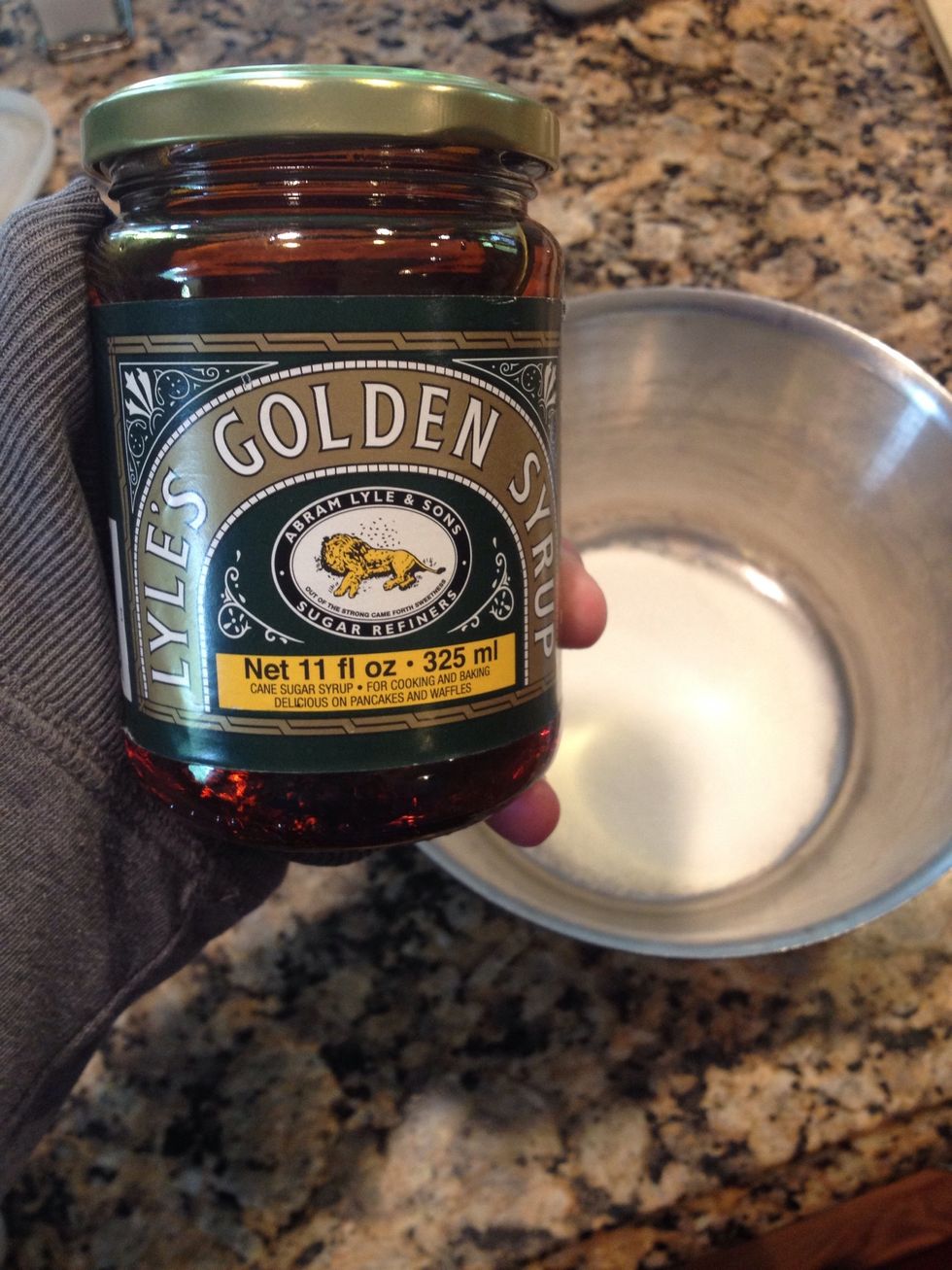 While your crust is cooling (or while it's baking) start your caramel sauce: 1 c sugar, 3/4 cup lyles golden syrup, and 4 TB water