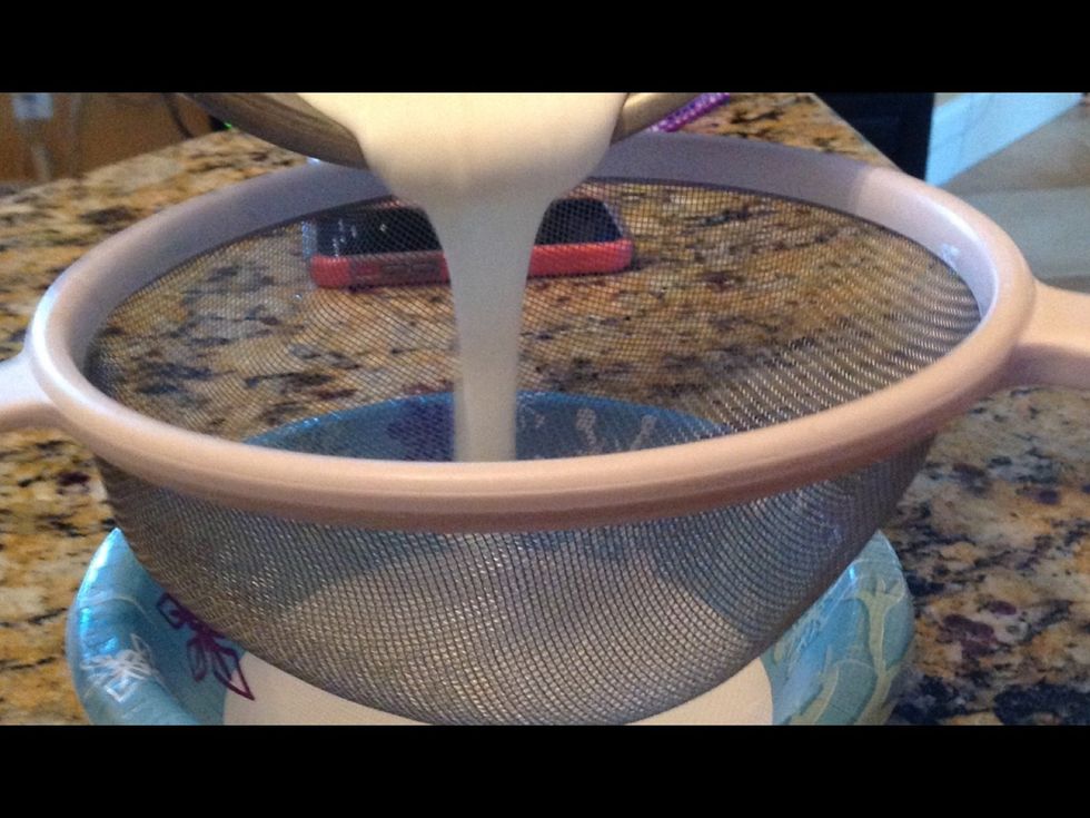 While your dish soap is freezing strain out the clumps of your mixture your going to use the non clumpy solution