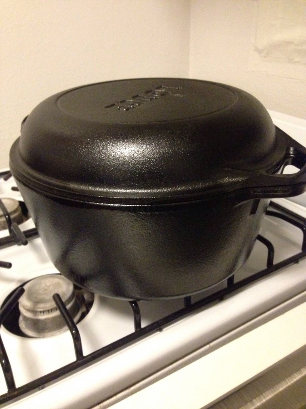 While your dough is resting, grab your Dutch oven. I LOVE my Lodge cast iron 5qt Dutch oven and would highly recommend it! You'll want to use a smaller Dutch oven if you want a taller, domed bread.