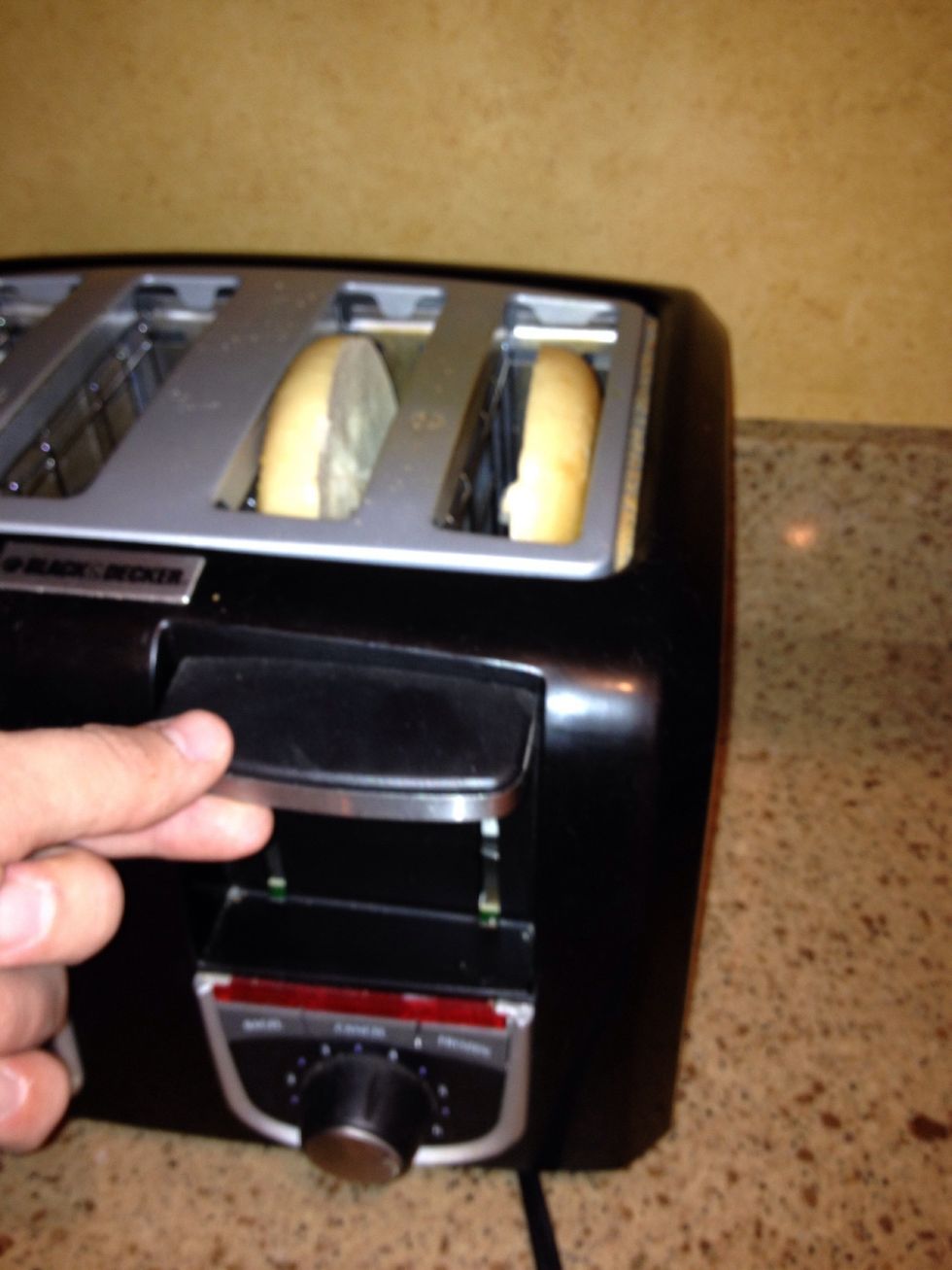While your egg is cooking, put a bagel in the toaster so when your egg is done the bagels will be too!