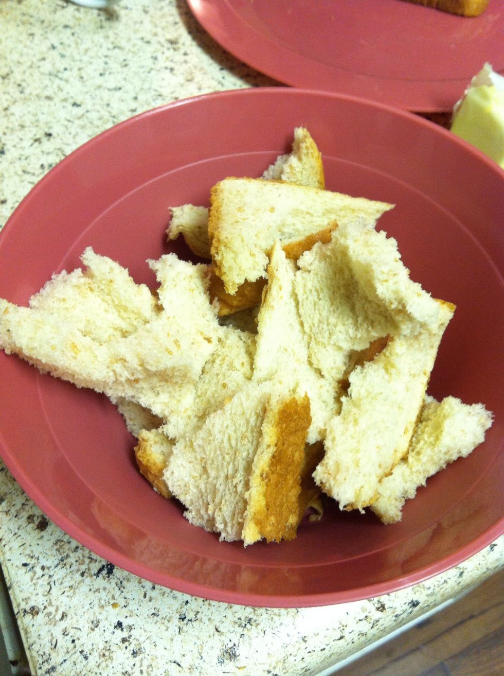 While your eggs cook, tear up your bread into strips/chunks. You can use stale bread but we always use fresh whole wheat or whole grain bread. I use one piece of bread per egg.