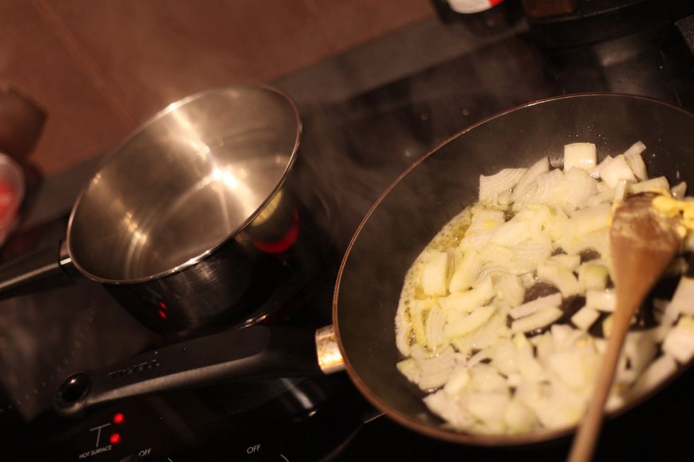 While your onion is cooking, boil hot water for your chicken.