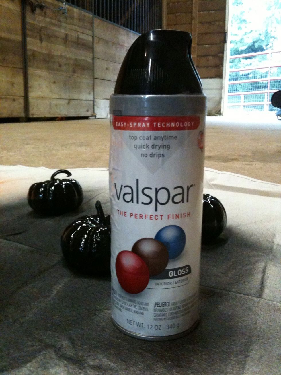 While your pillars are drying, spray paint some little pumpkins.