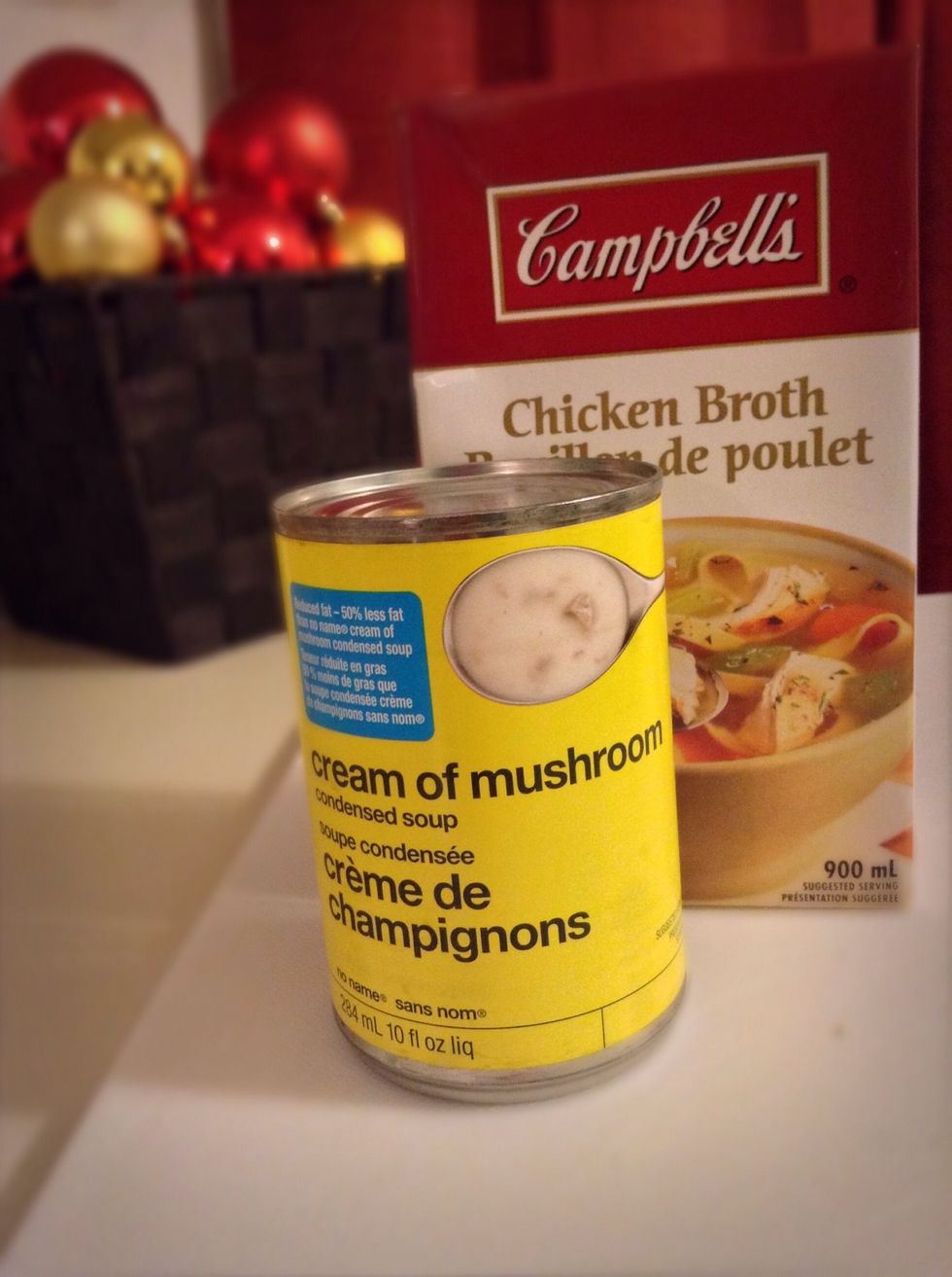 While your pork chops are in the oven grab a small sauce pan and mix together your chicken broth and condensed mushroom soup. Bring to a boil. Sorry I don't have a picture of it I completely forgot!