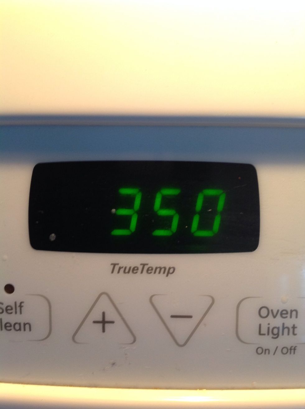 While your putting the dough on the pans, change the oven to 350 degrees F.
