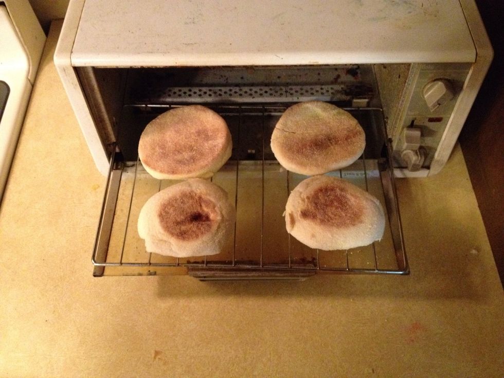 While your sausage & egg are cooking, place your english muffins in a toaster to heat them. I like it to be a little crispy but not too much.