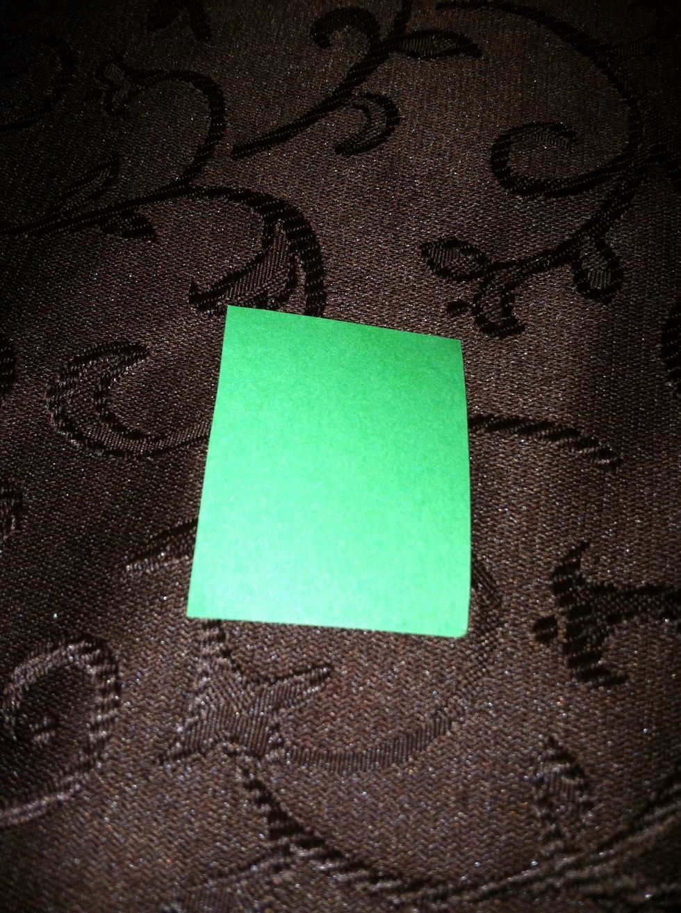 While your toothpicks dry and your glue dries as well, get your construction paper and scissors. I like to cut small squares out of the construction paper.