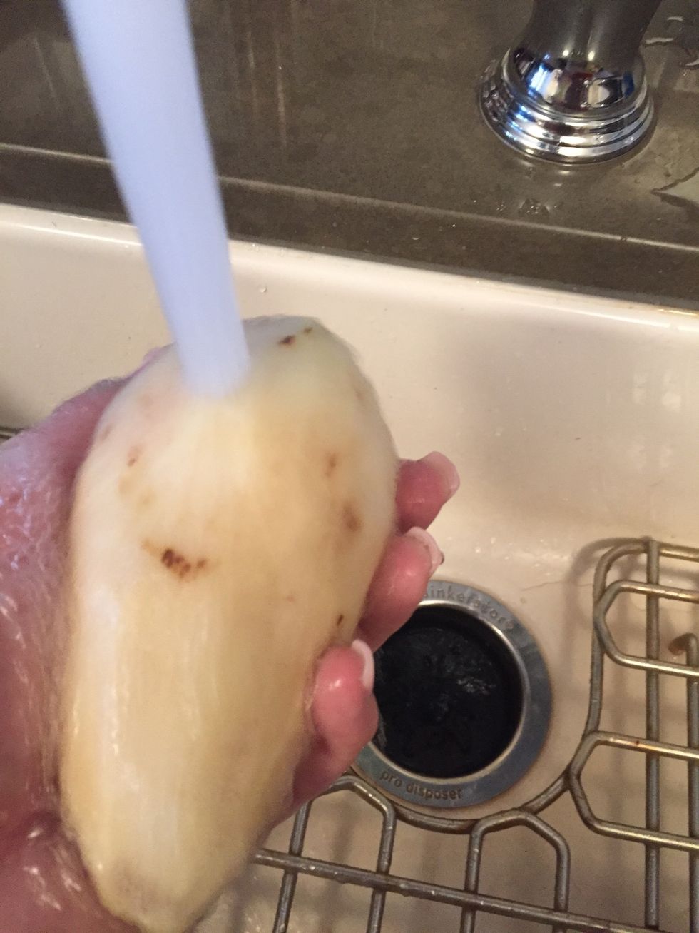 While your vegetables are softening (and bacon is still cooking) peel and clean off the potatoes.