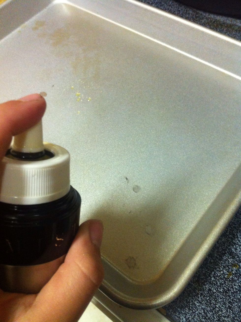 While your waiting, preheat your oven to 450 degrees F.... And grease your pan....