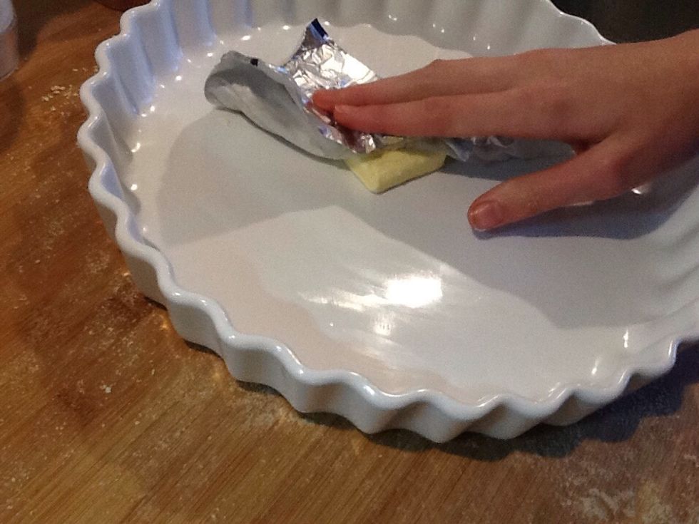 Whilst butter is melting rub extra butter (or just the wrapper the butter was on) on to a large-ish tart dish.
