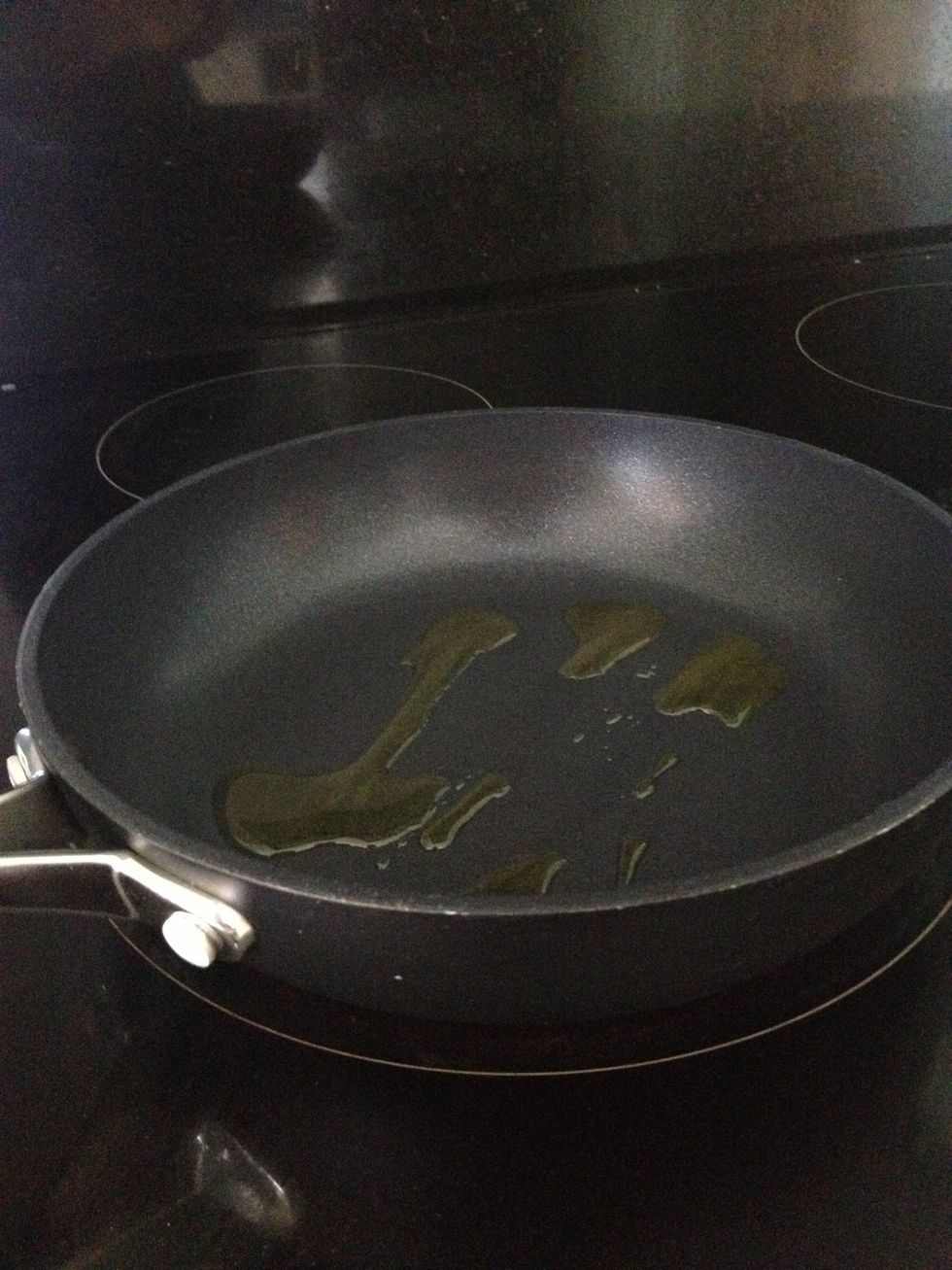 Whilst the asparagus is cooking, add a little olive oil to a small, hot pan. If your pan is non stick you won't need very much, otherwise, add a little more.