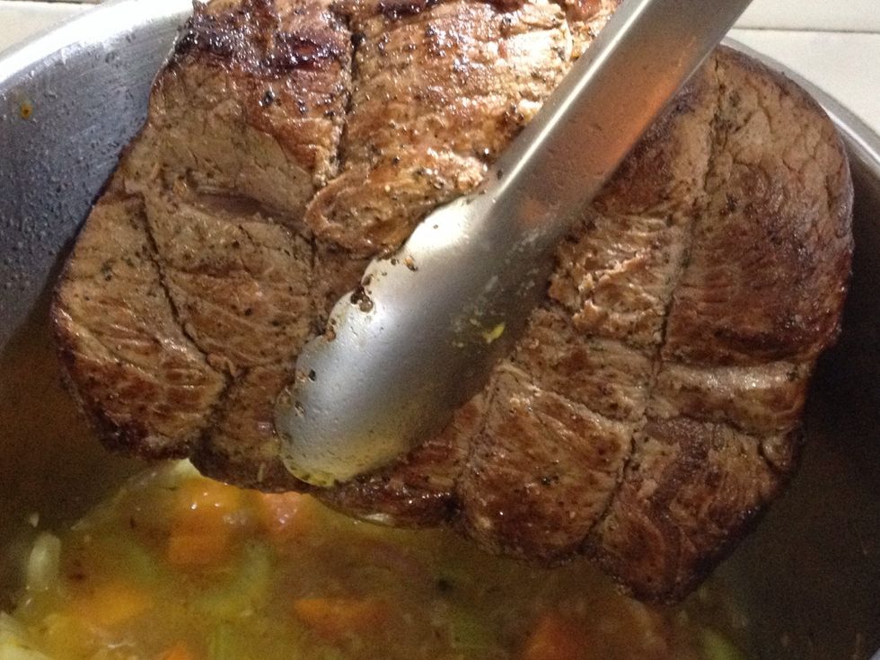 Whilst the meat is braising, turn it every 30 minutes. After 2\u00bd to 3 hours, the meat should be almost tender (a sharp knife inserted in the center should meet little resistance).