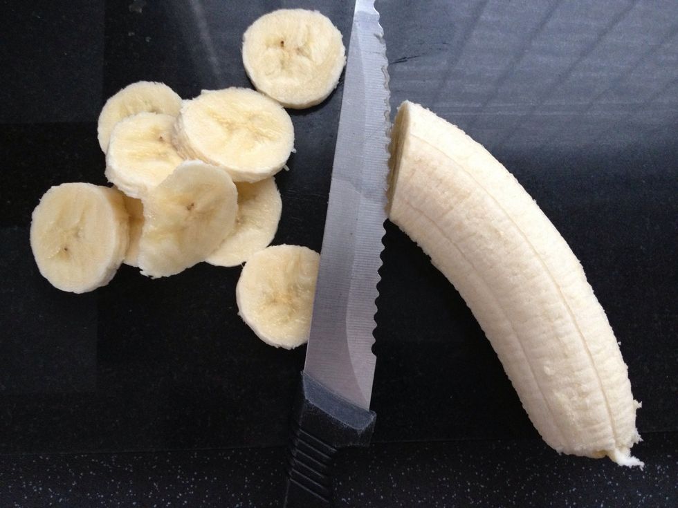 Whilst the porridge is cooking, take your banana (or half a banana if you prefer) and start to cut it into small bite size sections.