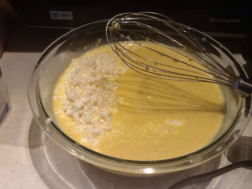 Whip dozen eggs, almond flour, baking powder, salt, pepper, and almond milk. Add in 2 cups feta.