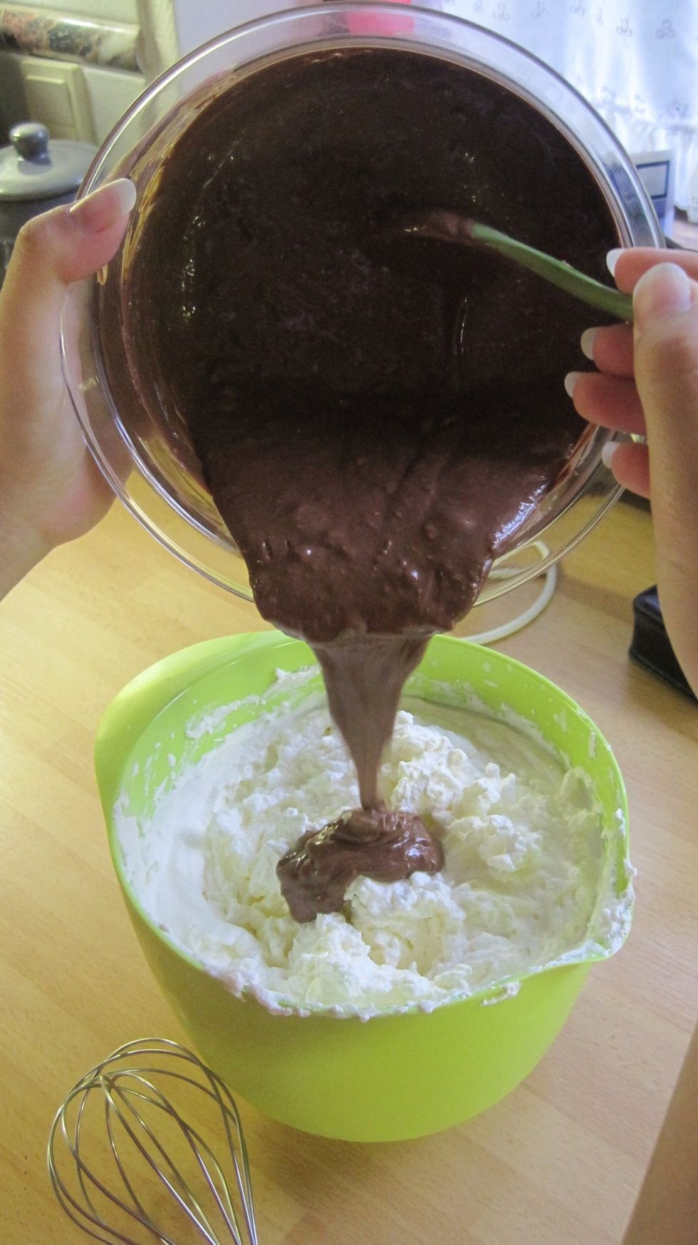 Whip half of the cream and mix in the Toblerone.