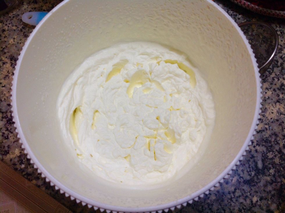 Whip it on medium or high speed until it becomes thicker, you can see the swirl appear, turn the electric mixer to low speed and continue whipping until it forms into hard peaks.