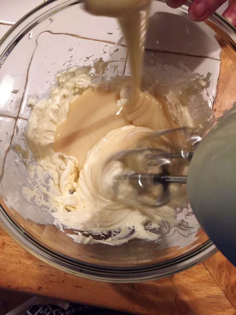 Whip room temperature cream cheese into mixing bowl until fluffy gradually add sweetened condensed milk