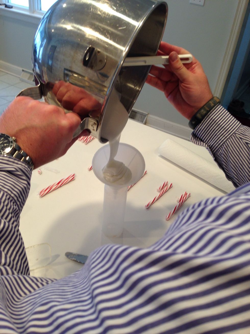 Whip that egg white with 1lb. Powdered sugar and water until it looks like this. Use a funnel if you have all day. I got bored and poured it directly into the bottle.