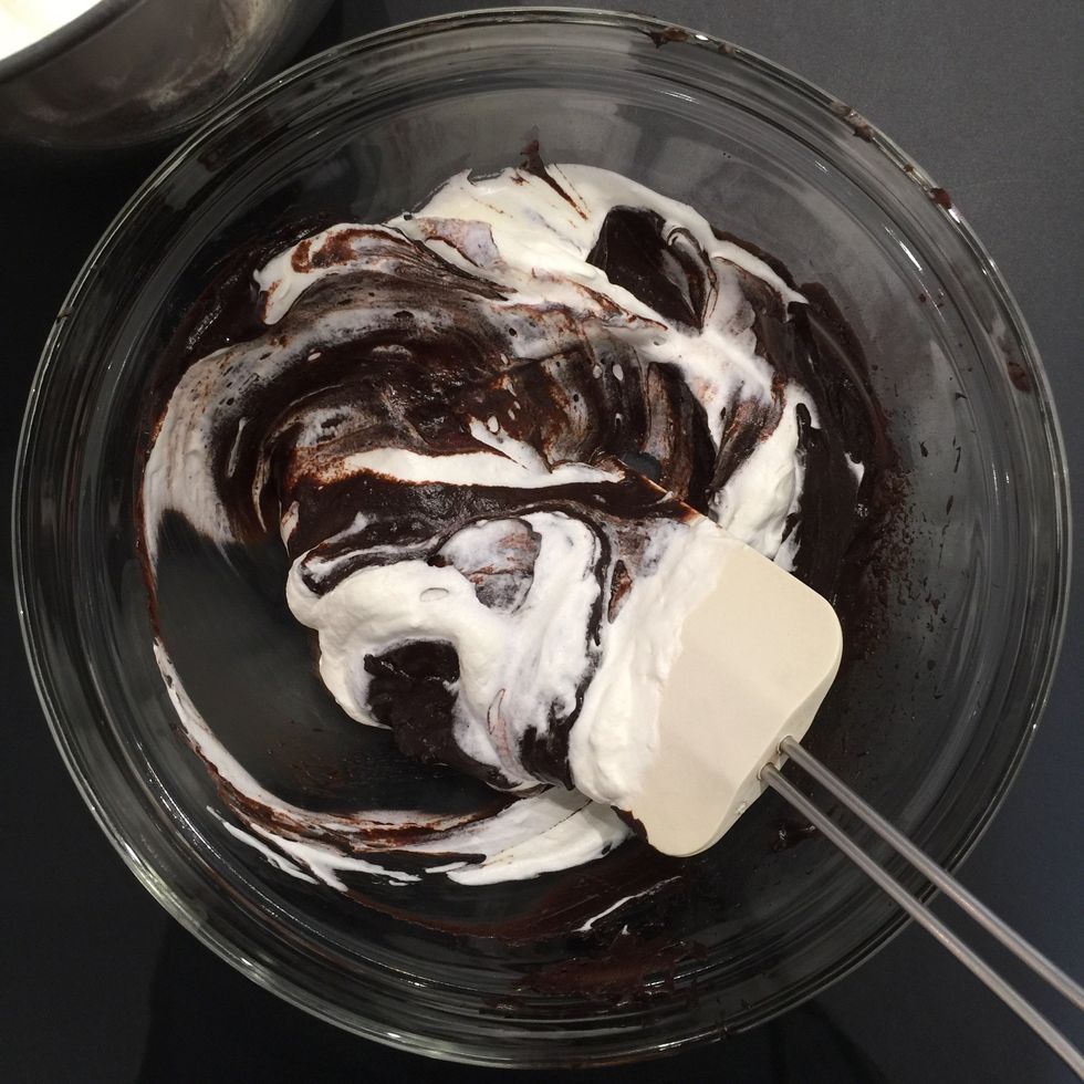 Whip the cream and fold in the chocolate mixture.