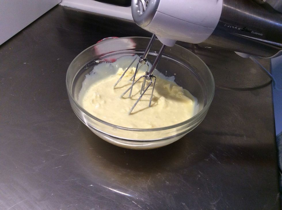 Whip together the cream cheese and condensed milk until the mixture is smooth.
