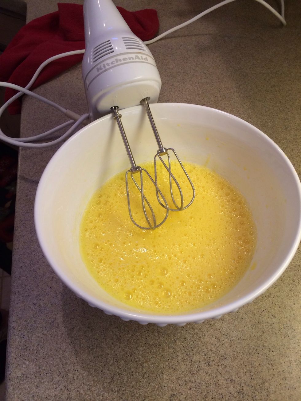 Whip up those eggs, and while mixing add 1.5 cups of Sugar.