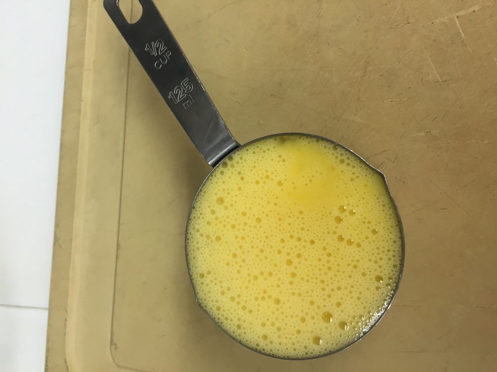 Whisk 1/2C of eggs.