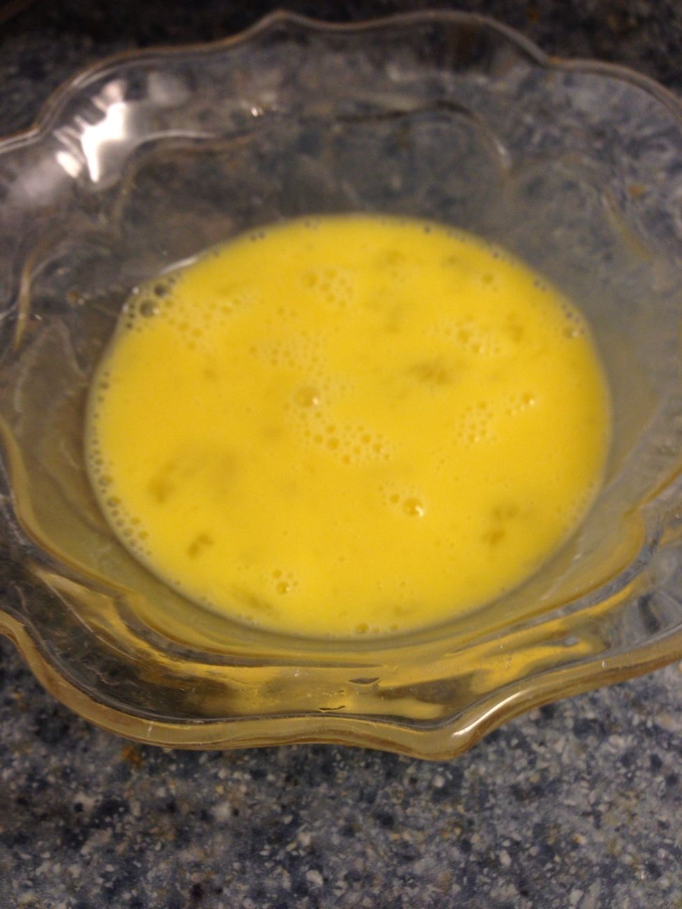 Whisk an egg in a bowl and brush it on to the wrapper. It's like a glue to keep it from unrolling.