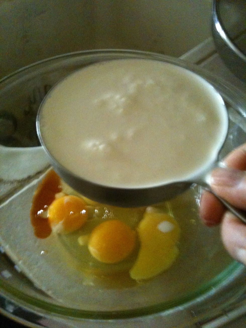 whisk cream, milk, eggs, yolks, and vanilla together in medium bowl.