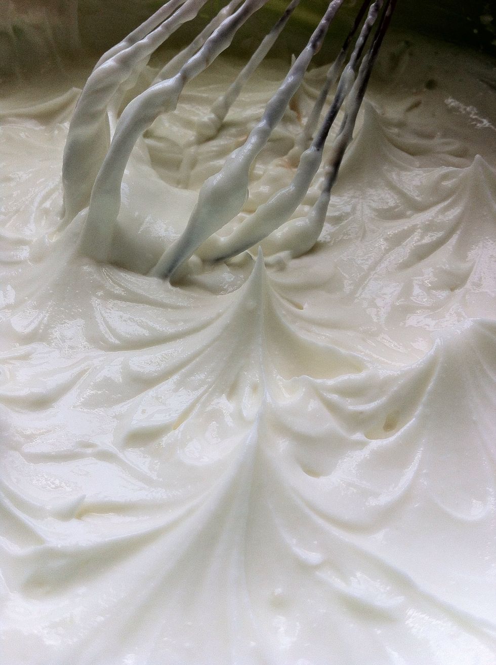 Whisk (do not whip!) the cheese and suger till nice and smooth.