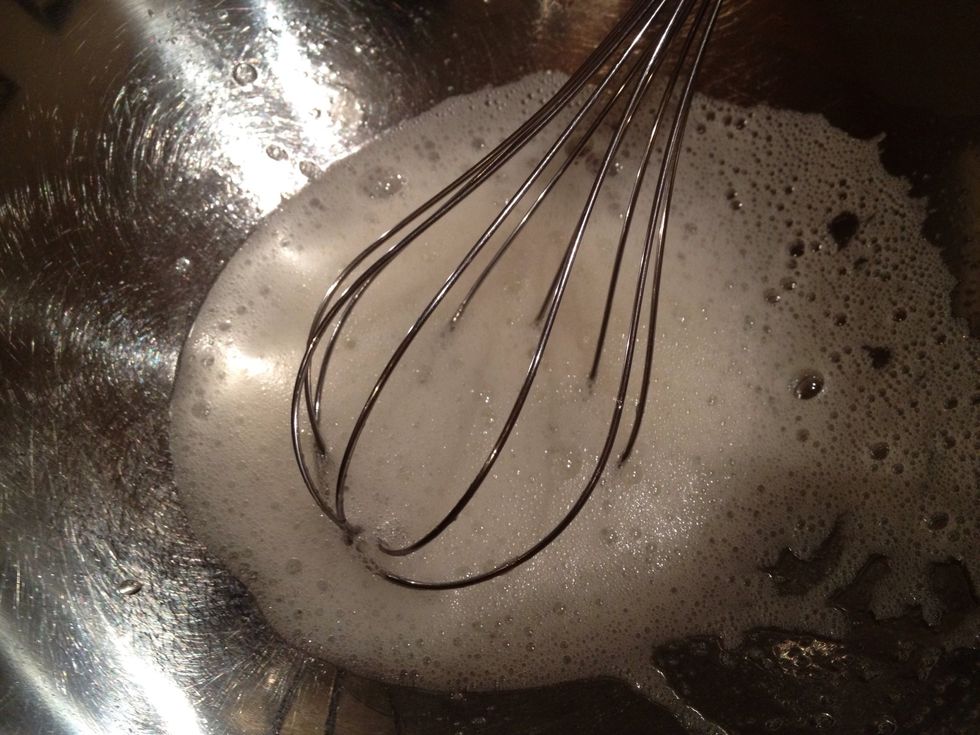 Whisk egg whites. Make sure egg whites is not contaminated with water or egg yolks.