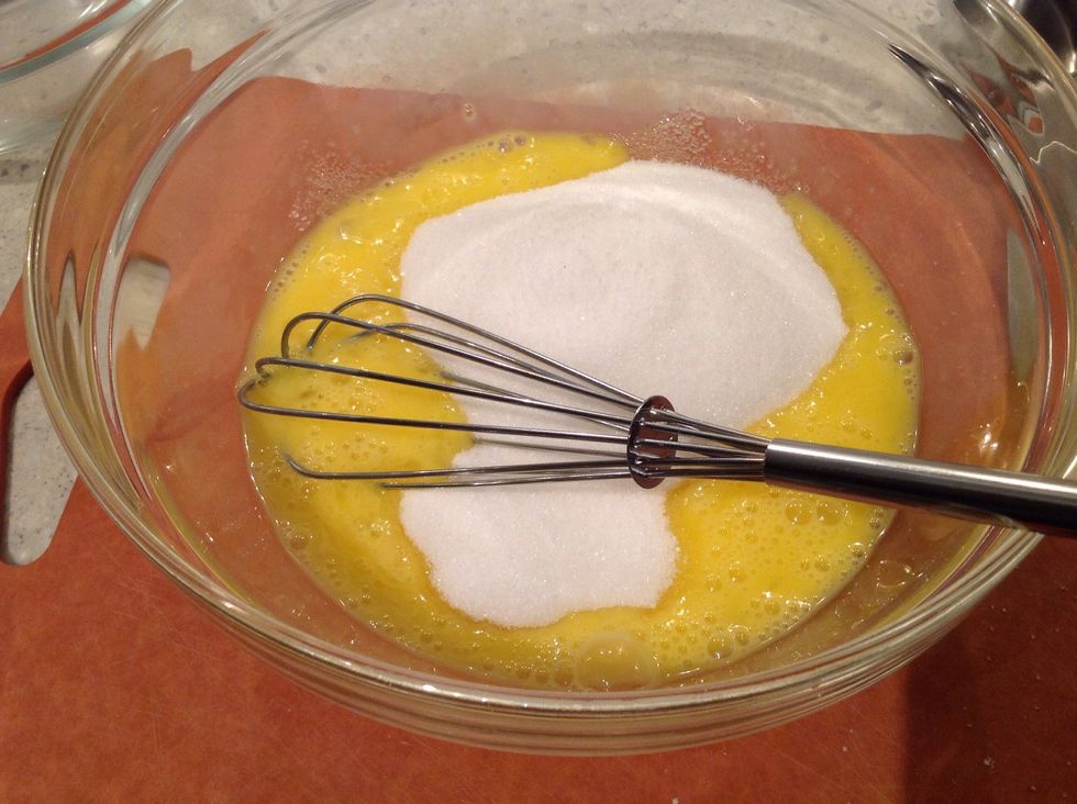 Whisk eggs and sugar.