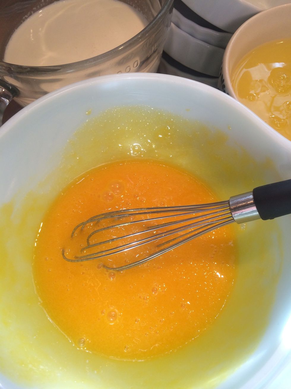 Whisk eggs.