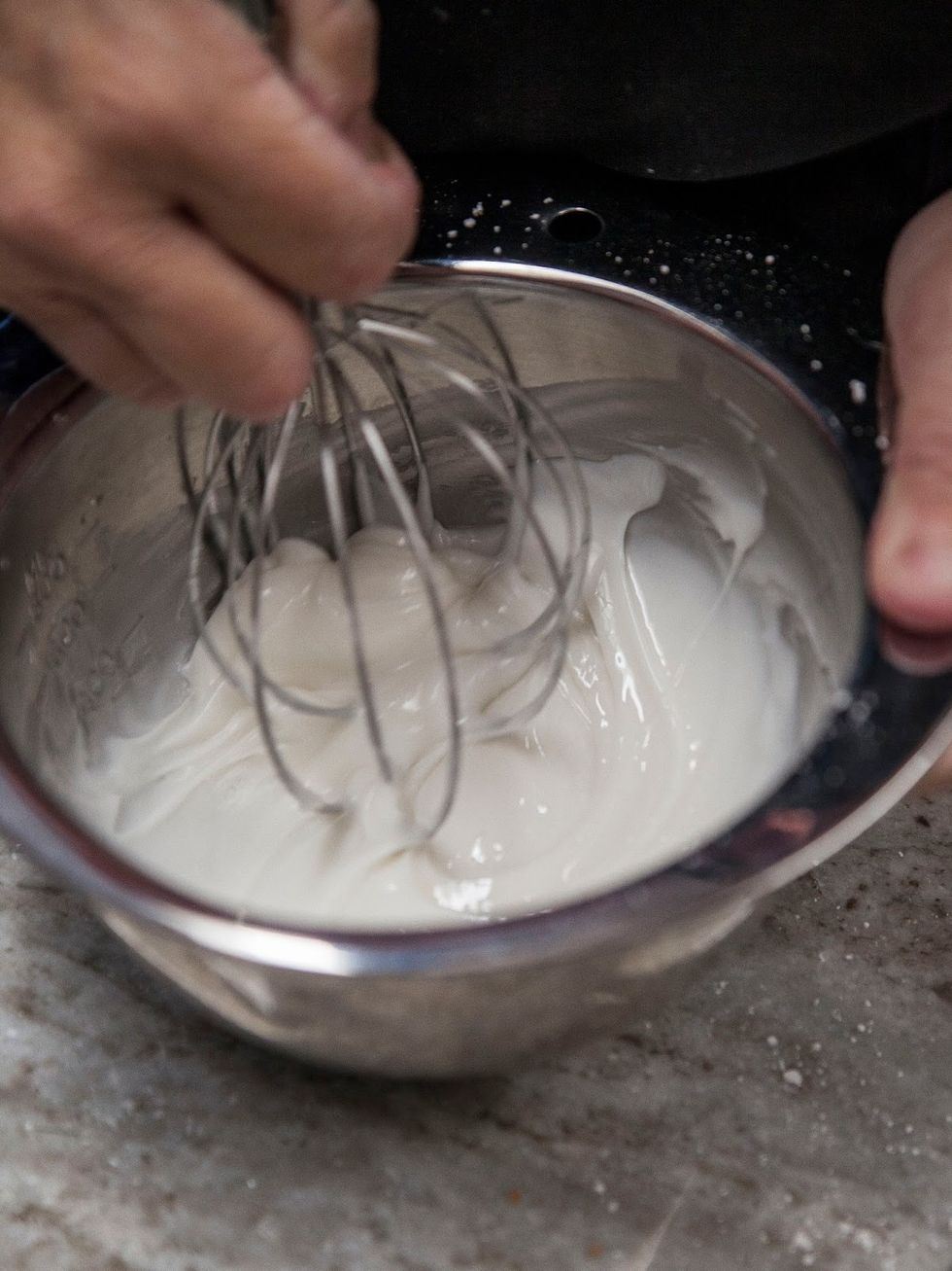 Whisk everything together until it's thick and smooth.If the icing is too thick, add a bit more water. If it's too thin, more powdered sugar.