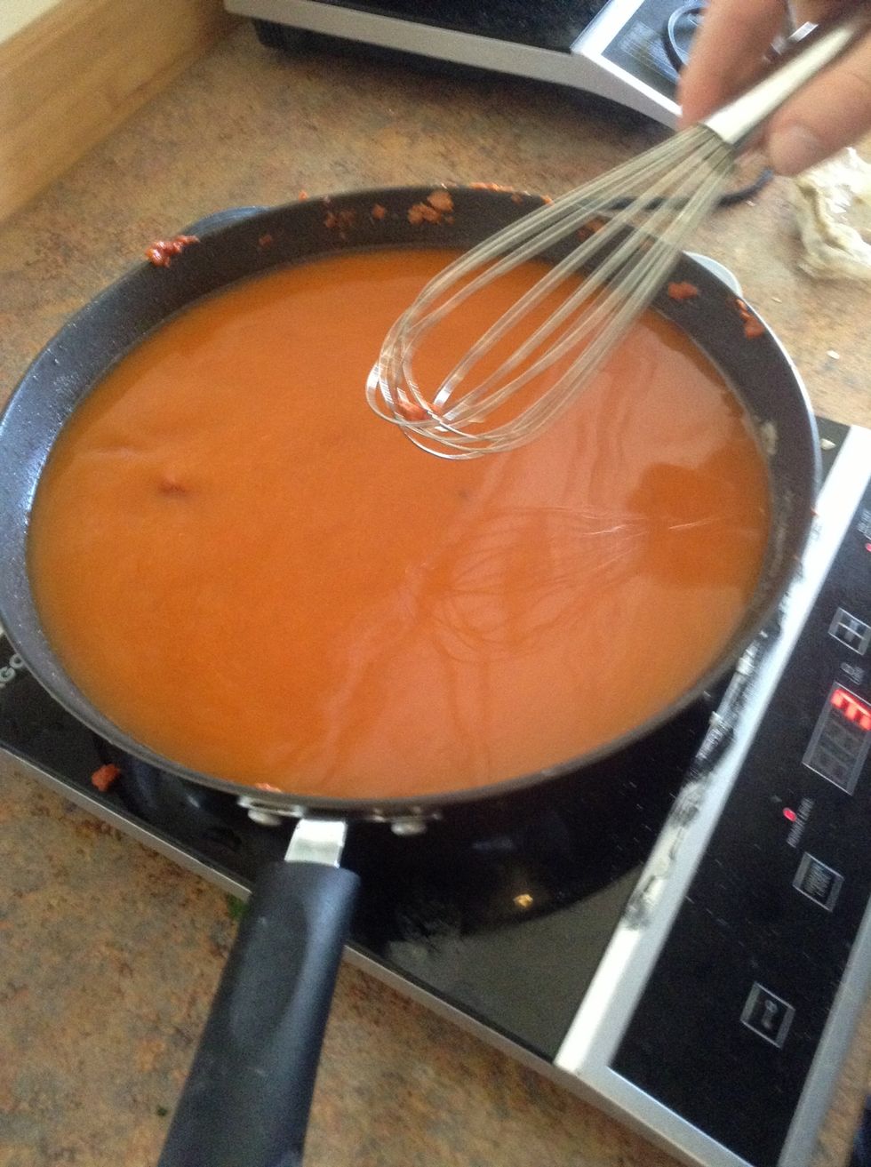 Whisk in chicken broth. Cook ingredients for 1 minute while whisking