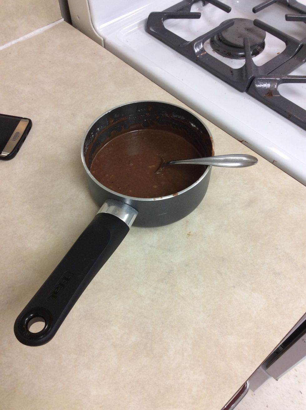 Whisk in Confectioner's sugar and vanilla until smooth.