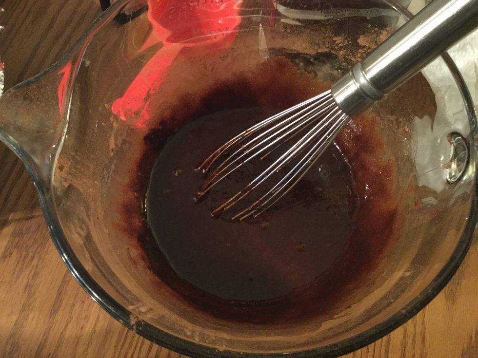 Whisk in eggs and vanilla into the bowl containing the other ingredients