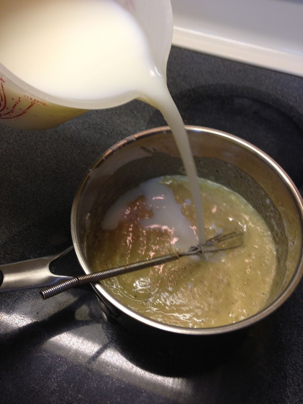 Whisk in milk slowly till well blended. Continue heating and stirring.