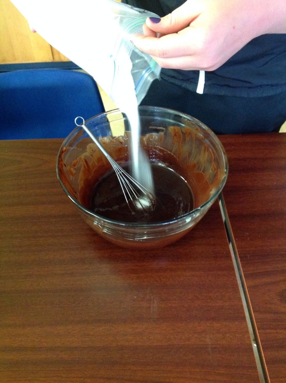 Whisk in sugar.