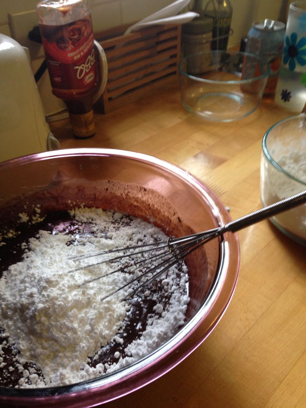 Whisk in the icing sugar.