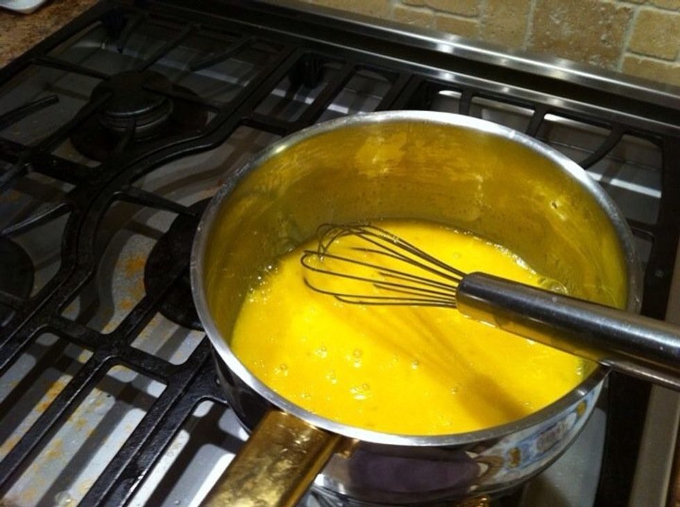 Whisk mixture on a double boiler.