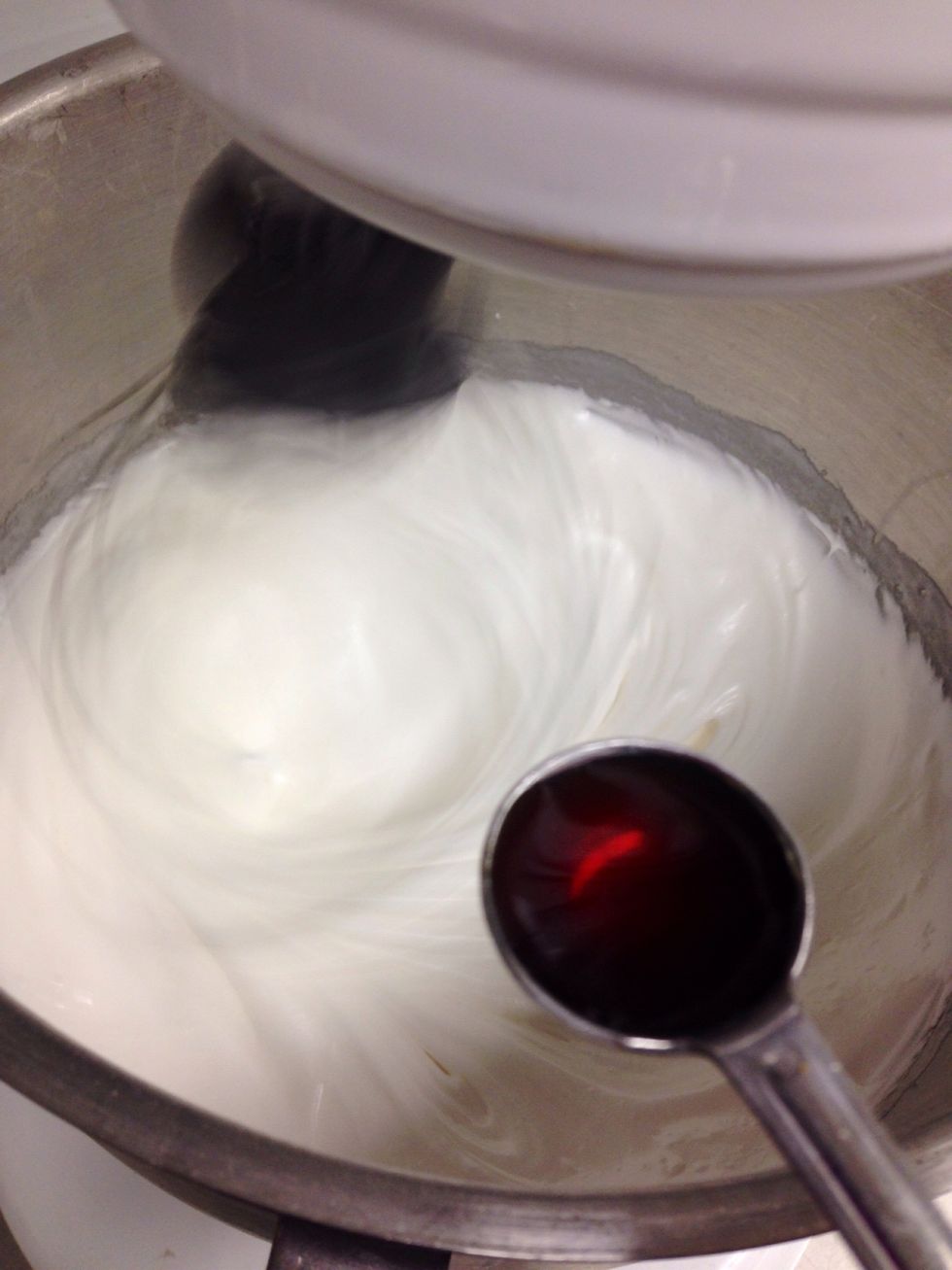 Whisk on high speed until firm peaks, add vanilla extract