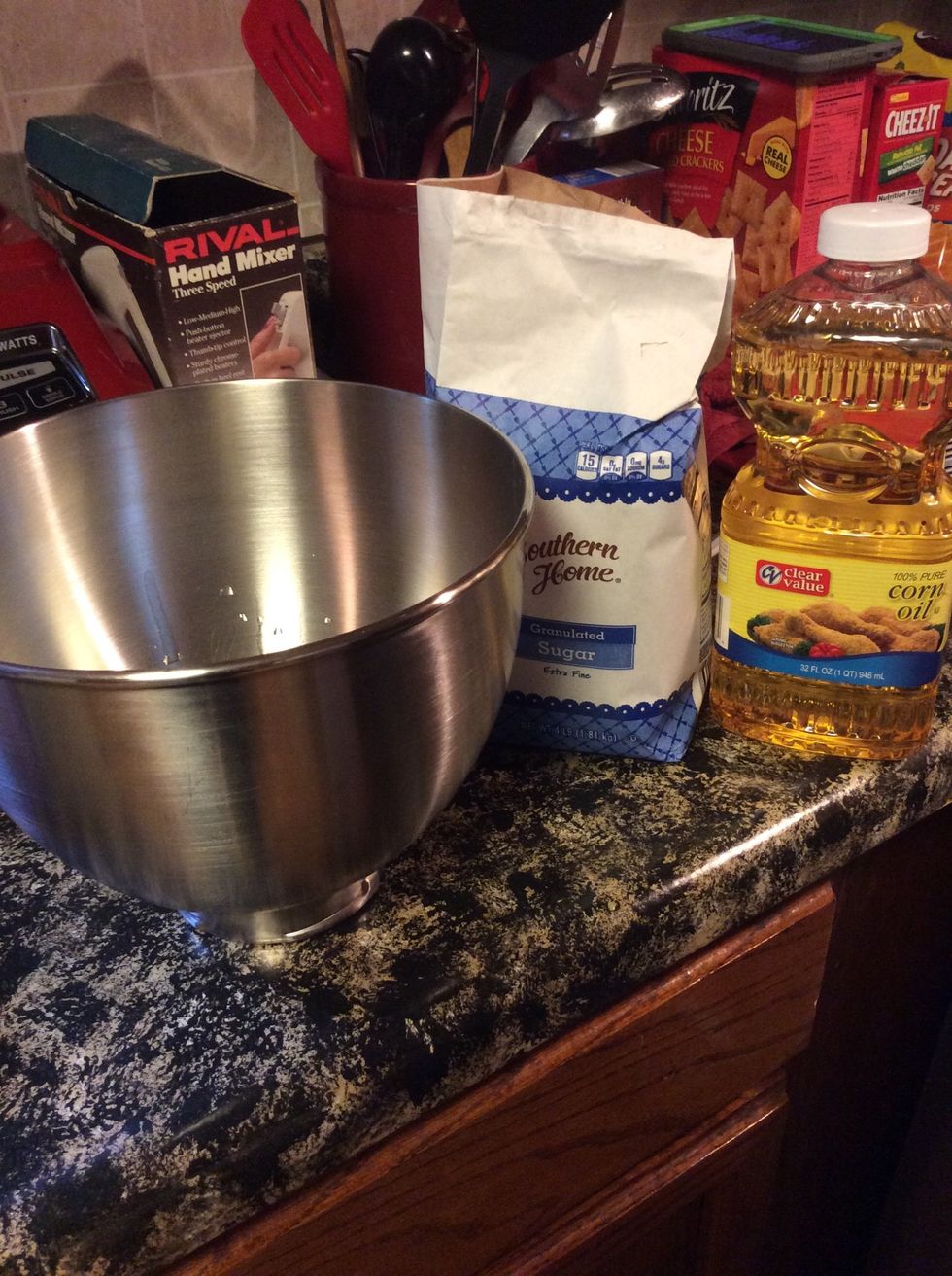 Whisk sugar and oil together