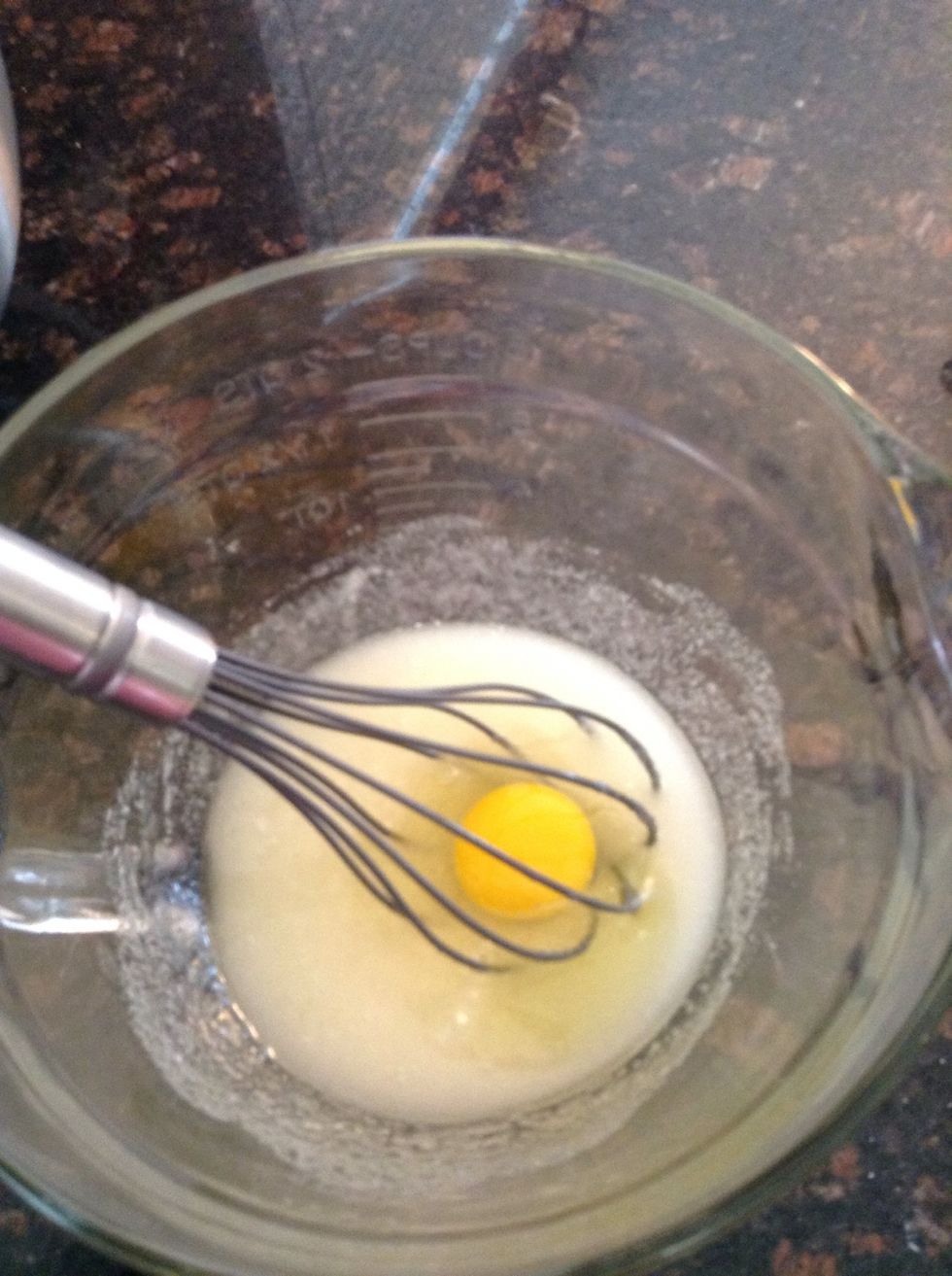 Whisk sugar, egg and oil together.