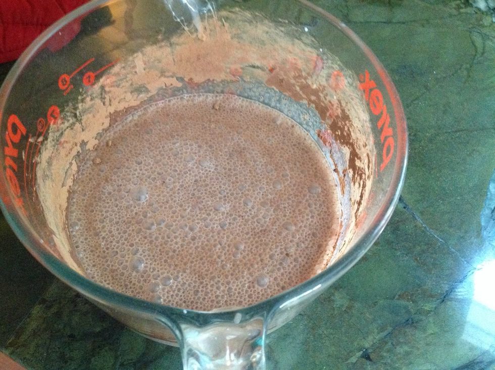 Whisk sweetened condensed milk, half-and-half, evaporated milk, and cocoa powder.