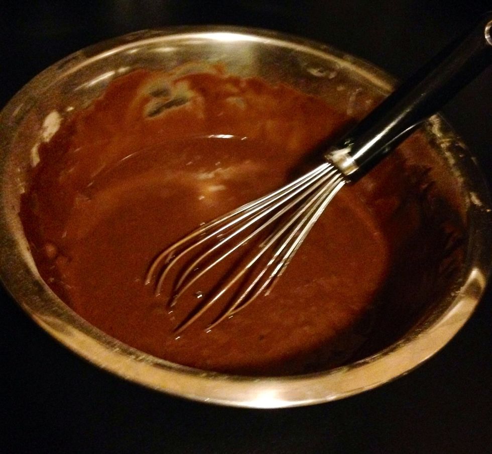 Whisk the brownie mix and water