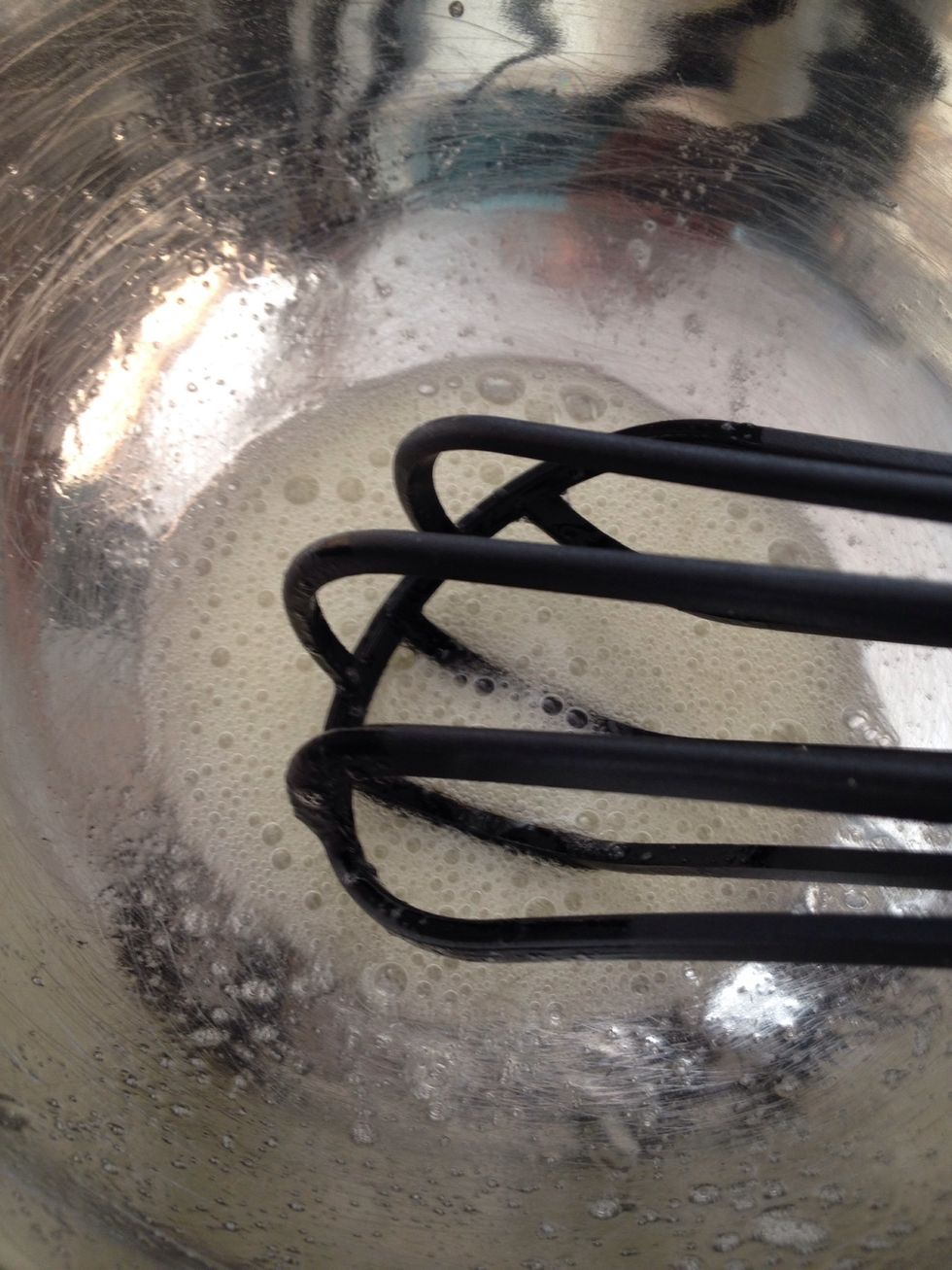 Whisk the egg whites until they appear foamy.