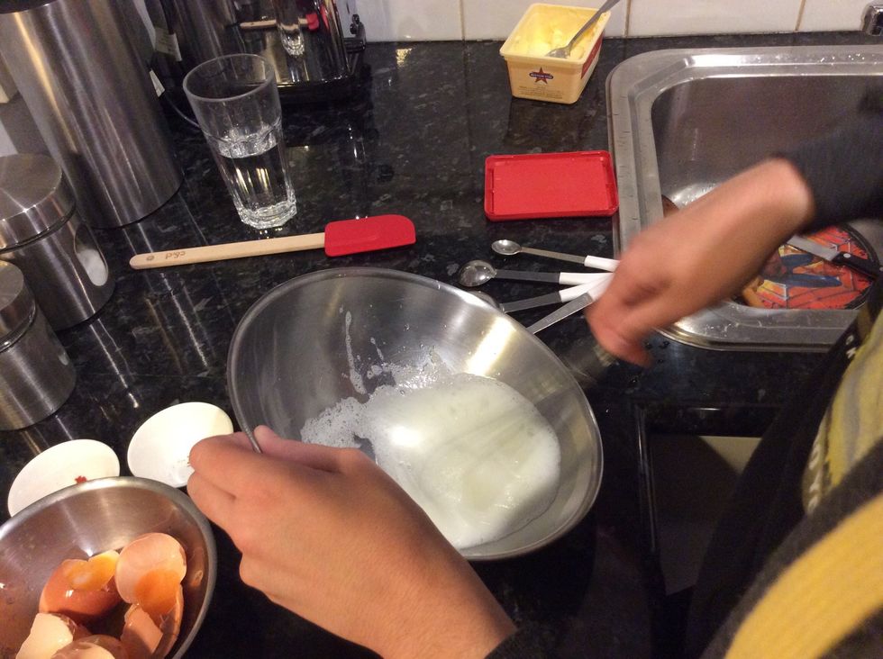 Whisk the egg whites until they look like shaving cream with soft peaks