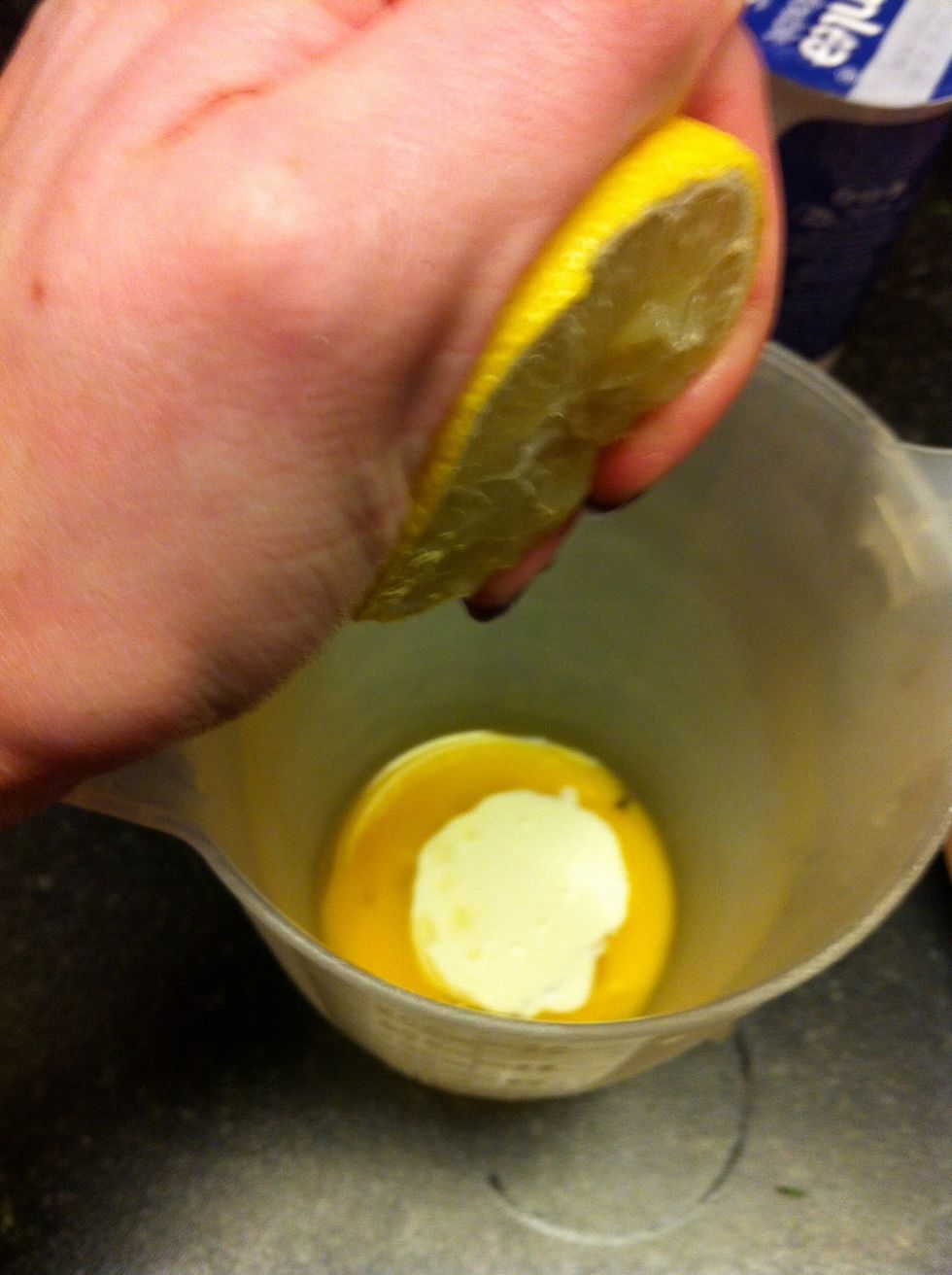 Whisk the egg yolk and a small amount of cream together, add lemon juice to taste and whisk again