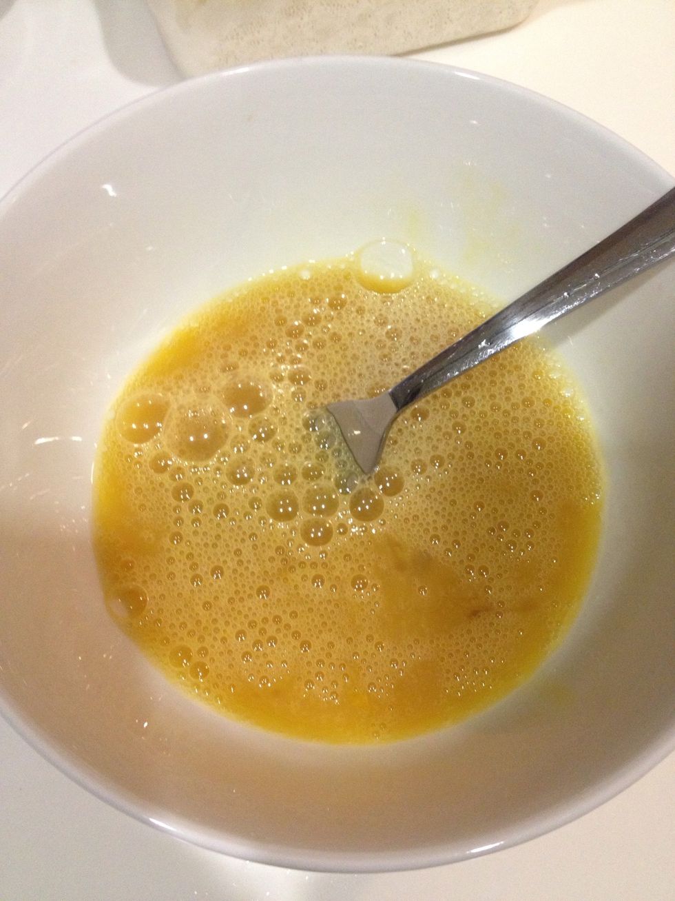 Whisk the egg.